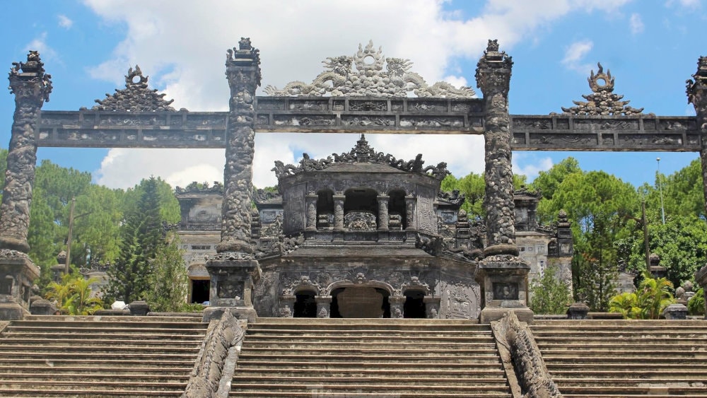 This gate showcases a blend of Vietnamese and Indian architectural elements, adorned with intricate carvings and symbolic motifs